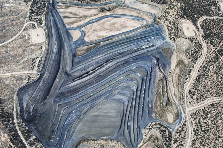 Aerial photo of graded coal and oil wells