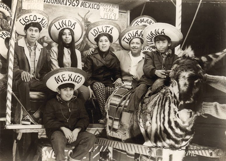 Photo of family seated together, wearing sombreros, celebrating New Years in 1969 