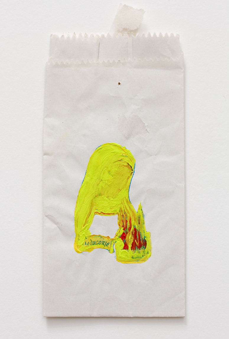 Gift shop bag with an image of Mary painted over in neon yellow
