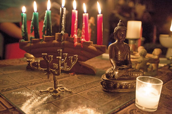 Candles and religious figures from multifaith service
